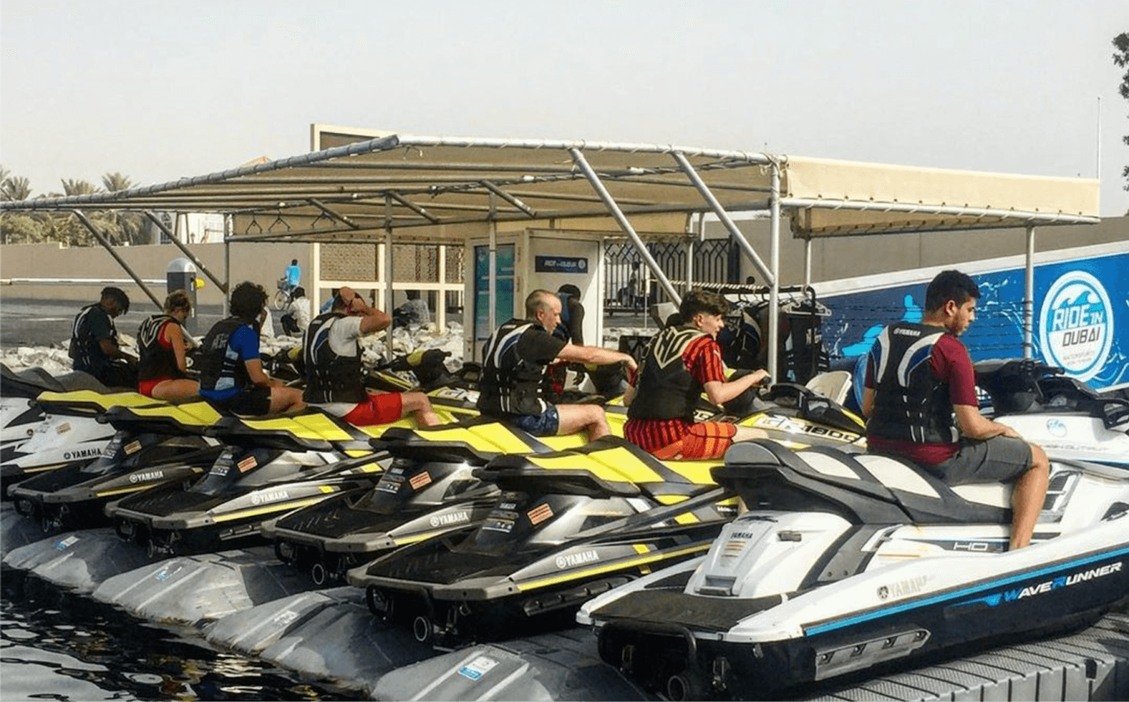 Families preparing for a jet ski session at Ride in Dubai, a top choice for fun activities in Dubai for families and one of the most trusted family activities in Dubai.
