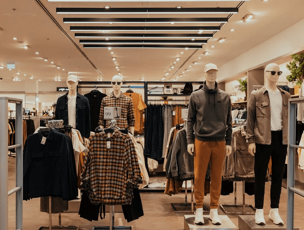 Interior of a clothing store in Dubai mall, showing a variety of fashion options for a birthday shopping spree.