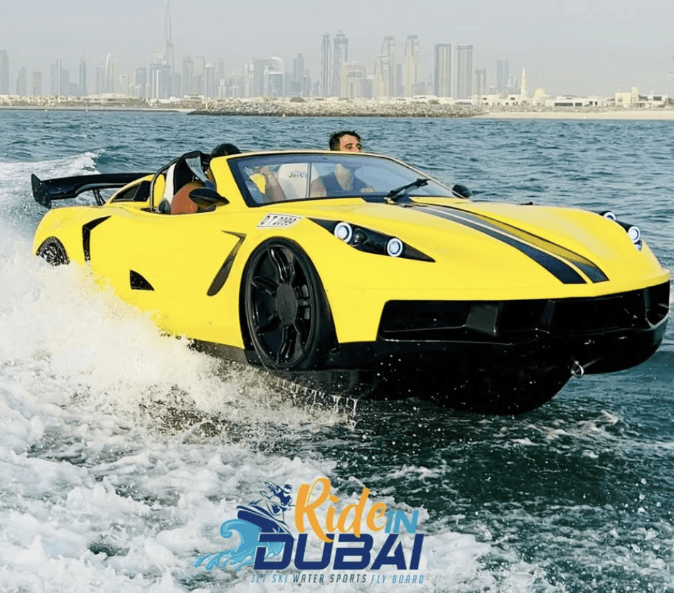 Man driving a yellow jet car on the water in Dubai with city skyline views, enjoying a thrilling jet car ride on the Arabian Gulf.